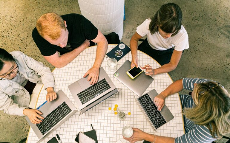 People Using Laptop Computers and Smartphone