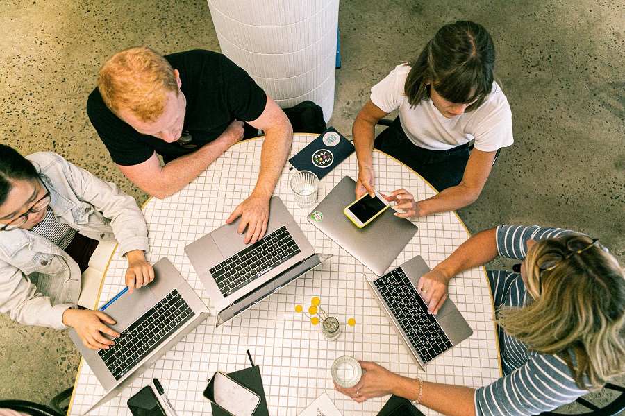 People Using Laptop Computers and Smartphone