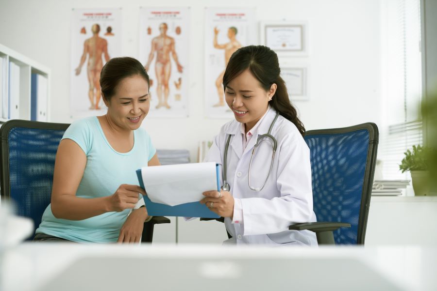 Doctor showing results to patient