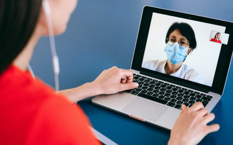 woman attending telemedicine session