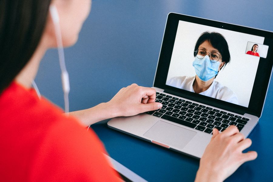 woman attending telemedicine session